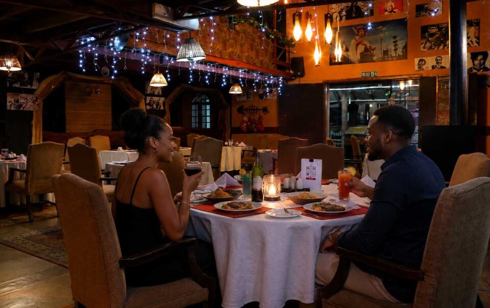 a couple dinning at kongoni camp nanyuki